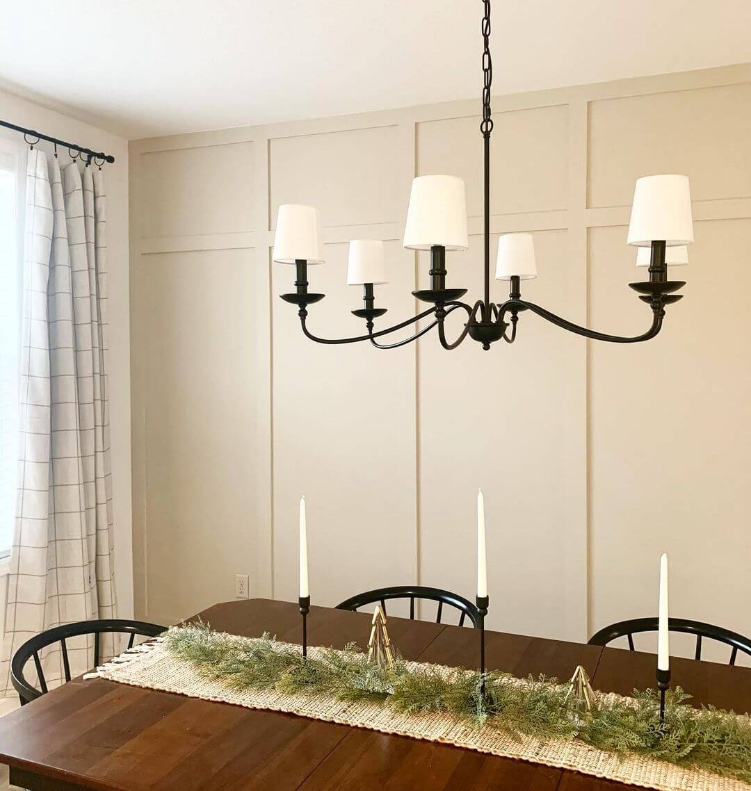 Cream Board and Batten Walls Frame a Simple Dining Scene