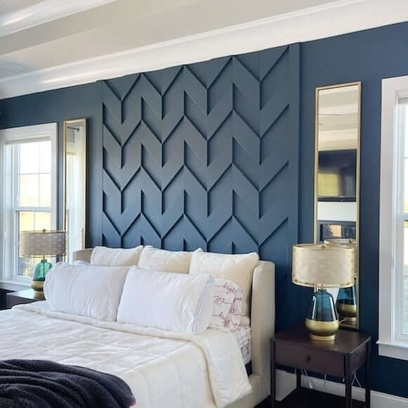 Chevron Pattern Adds Depth to a Dark Blue Accent Wall