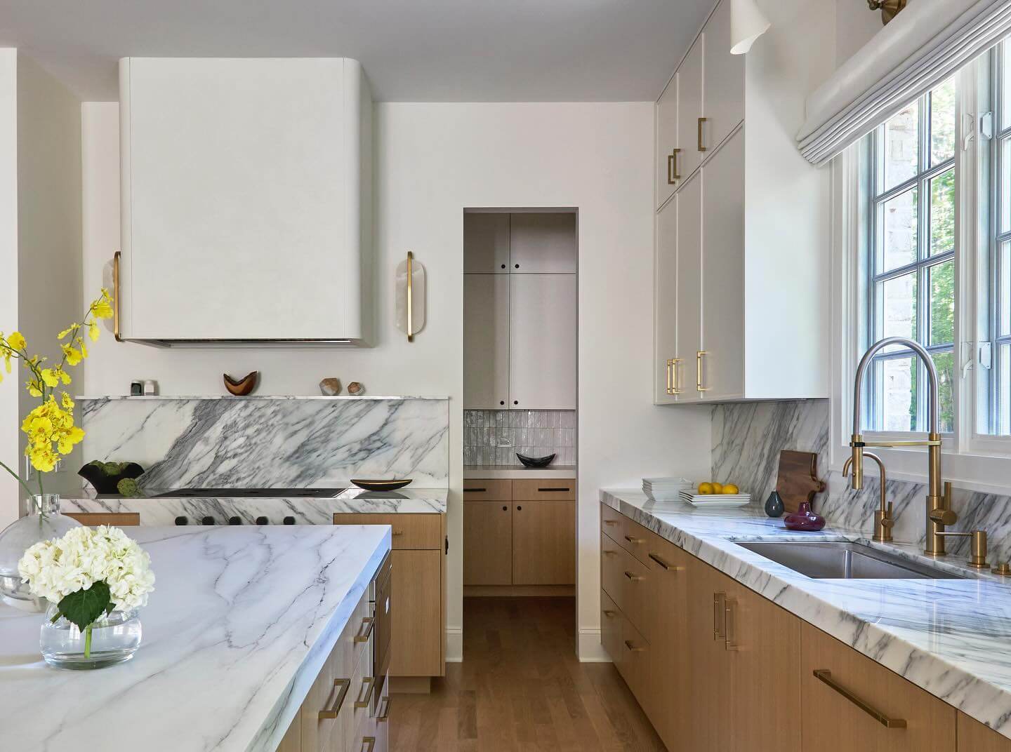 Soften a Marble Backsplash with a Curved Range Hood