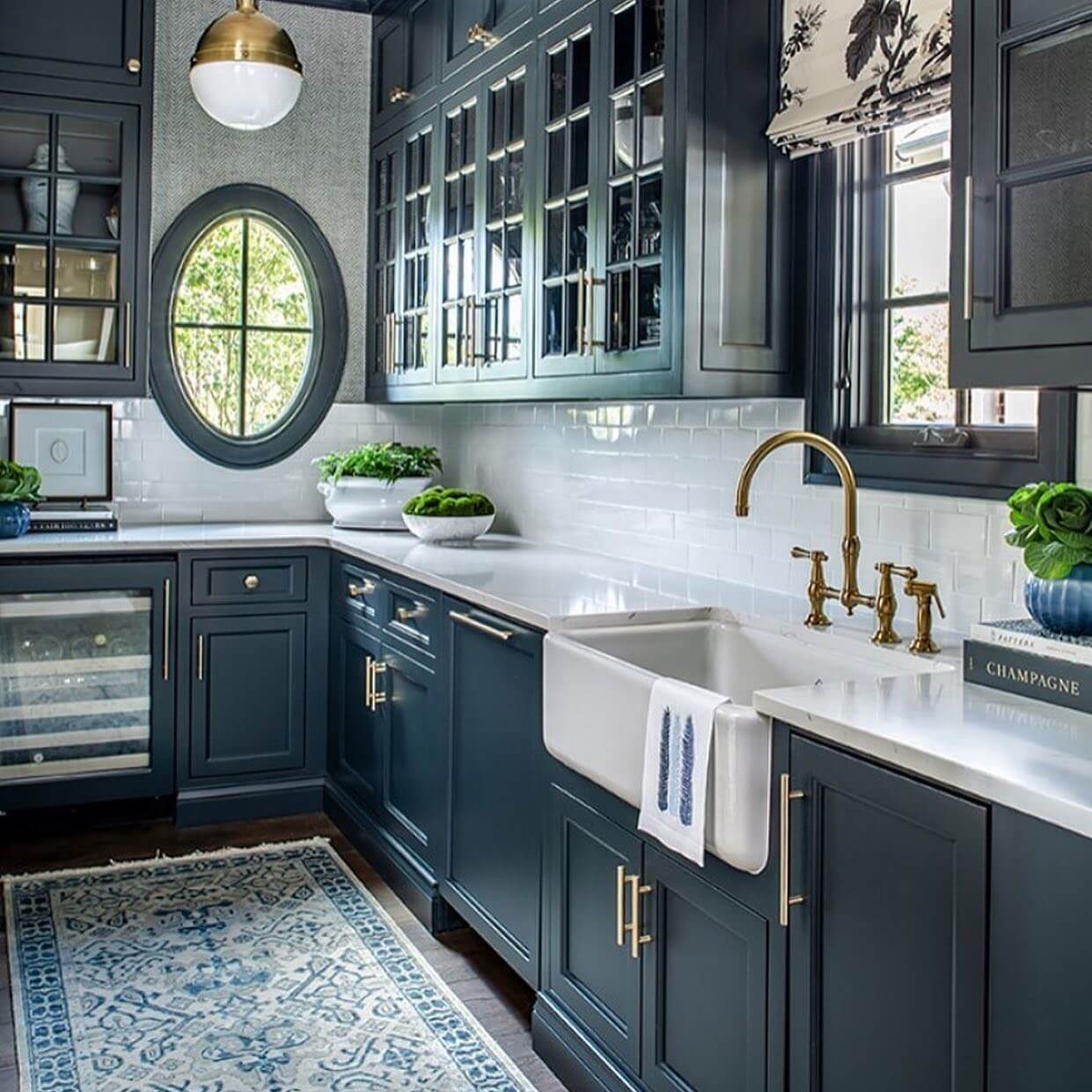 Brass Faucet With Double Handles Adds Warmth to Farmhouse Sink