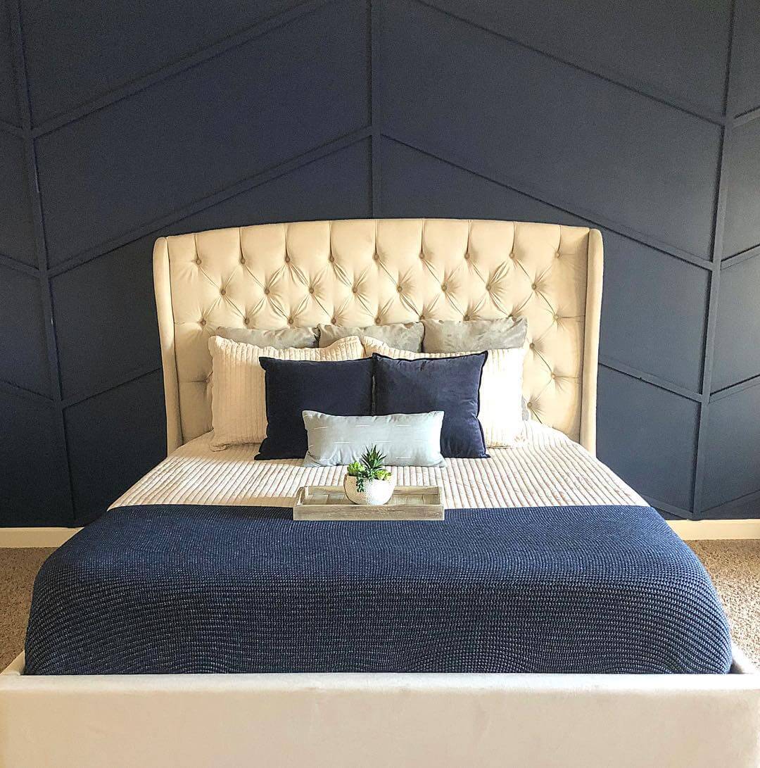 Geometric Navy Accent Wall Adds Depth Behind Your Headboard