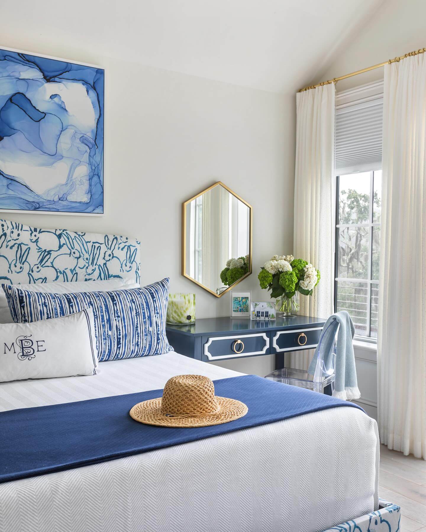 Bunny-Patterned Headboard Adds Whimsical Charm to Navy Bedroom