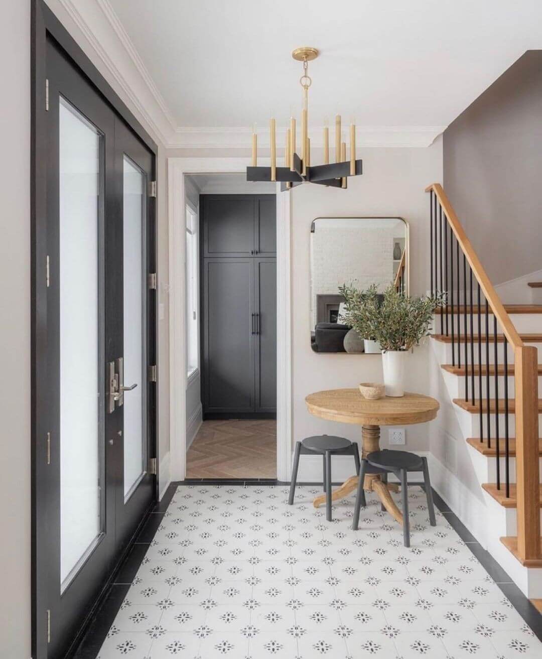 Warm Your Entryway with a Candle-Style Chandelier