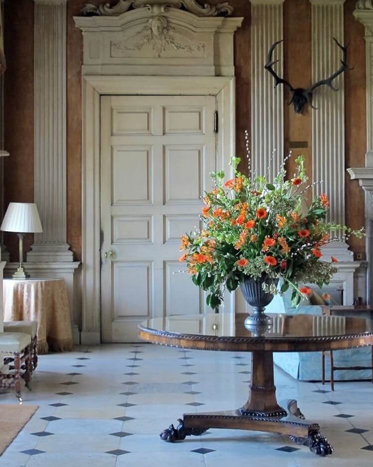 Round Table with Dramatic Urn of Flowers