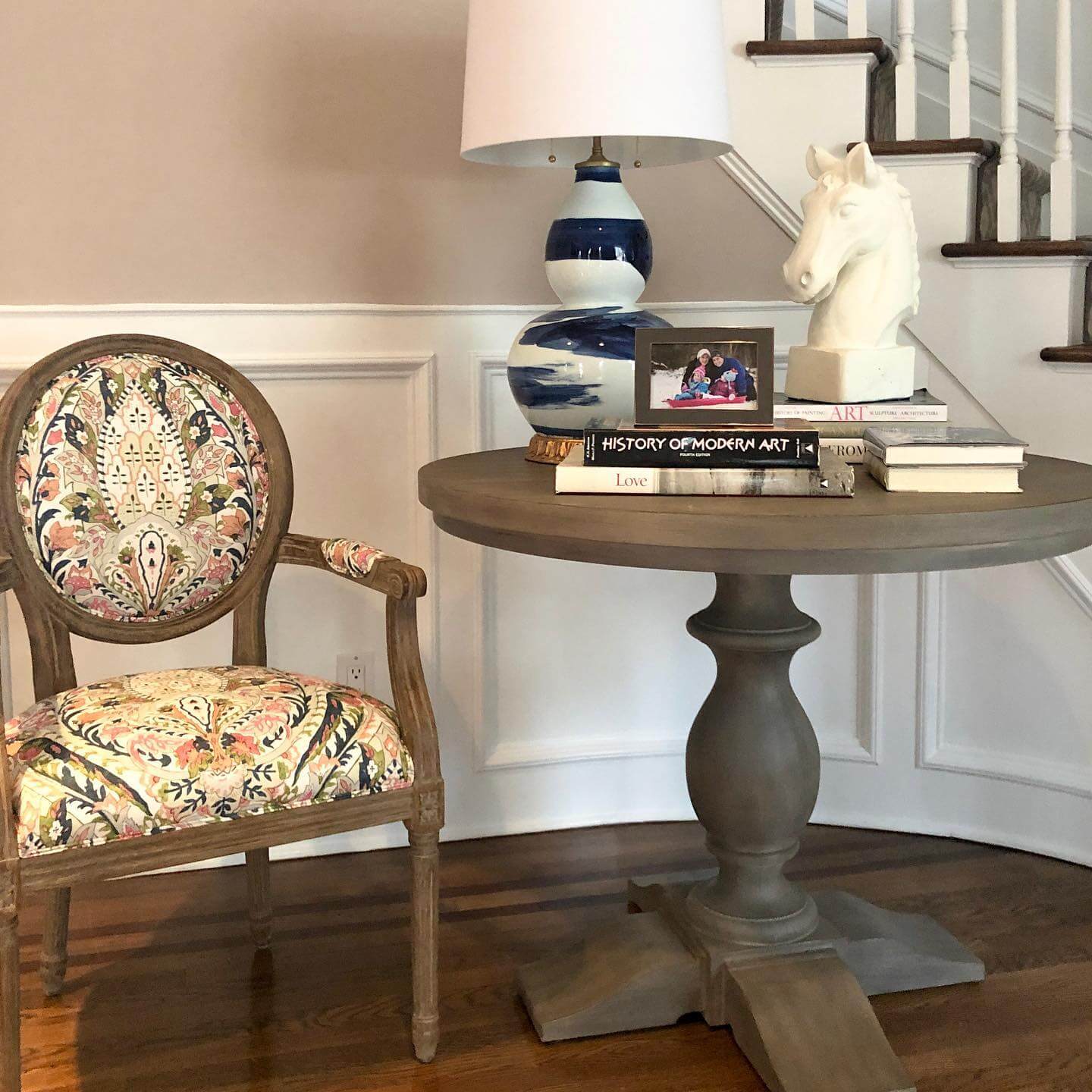 Pedestal Table with Books, Bust, and Photo