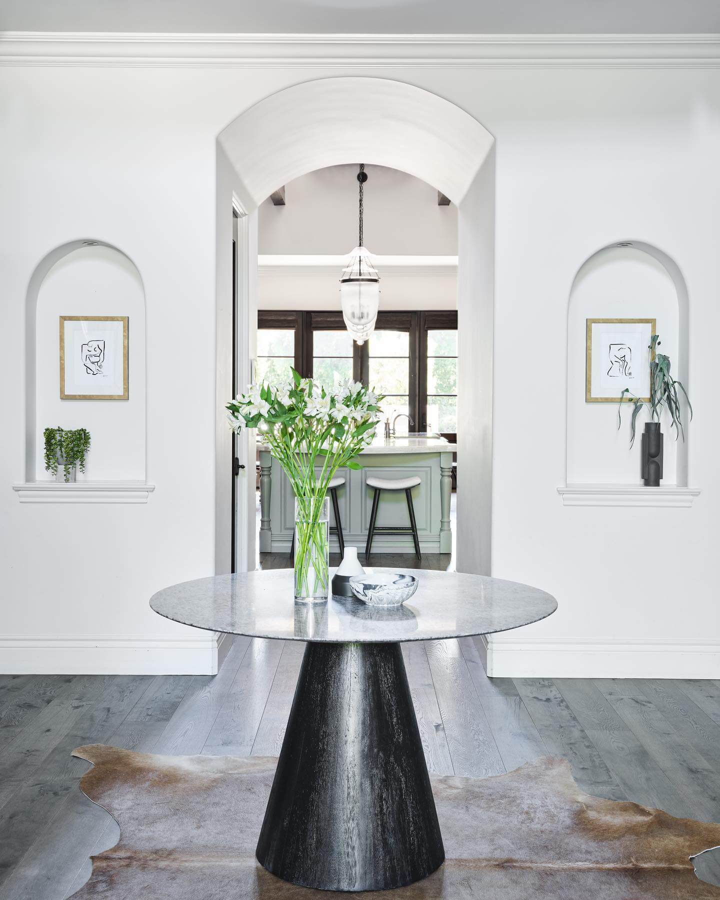 Speckled Grey Table with Art and Plants