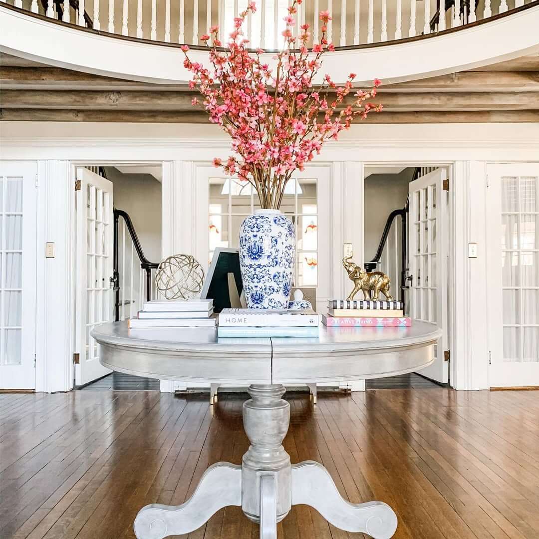 Blue and White Ginger Jar Holds Dramatic Pink Branches