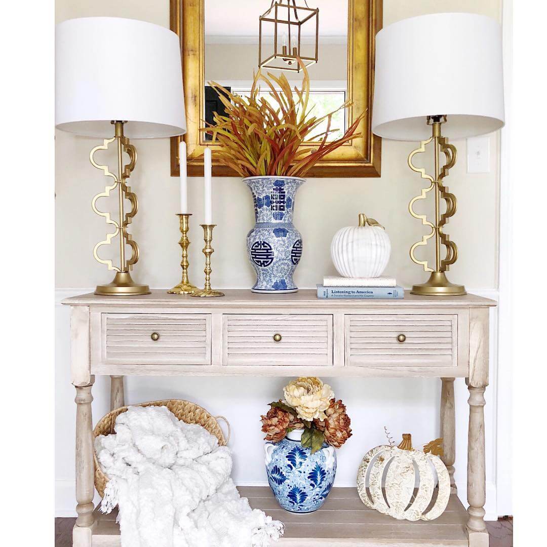 Blue and White Vase Holds Autumnal Foliage