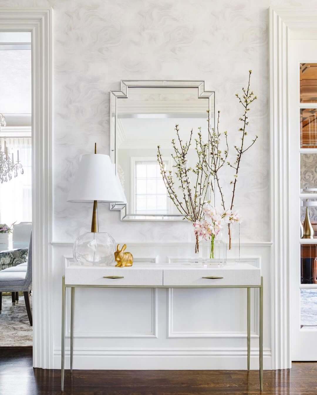 Clear Glass Lamp Base Adds Whimsical Form to Entryway Table
