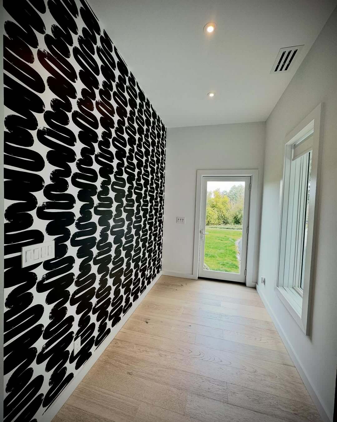 Bold Black Brushstroke Wallpaper for a Graphic Entryway