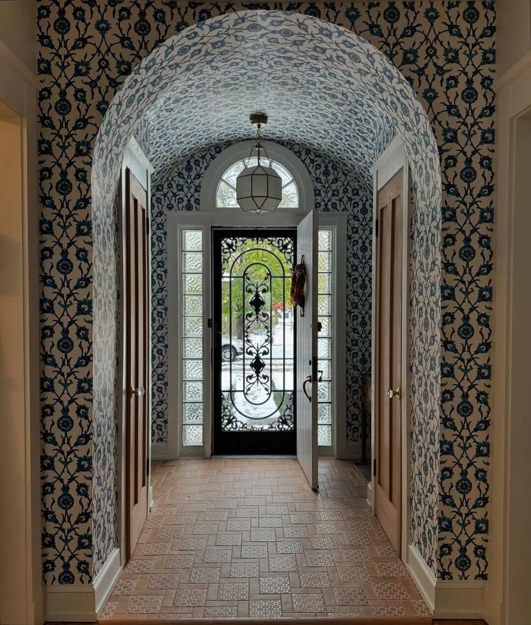 Arched Hallway Wallpaper Extends to the Ceiling