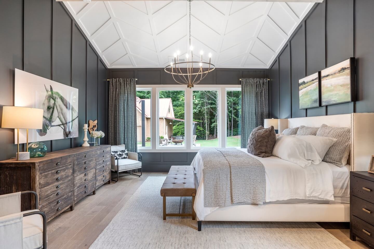 Paneled Walls Frame a Geometric Ceiling