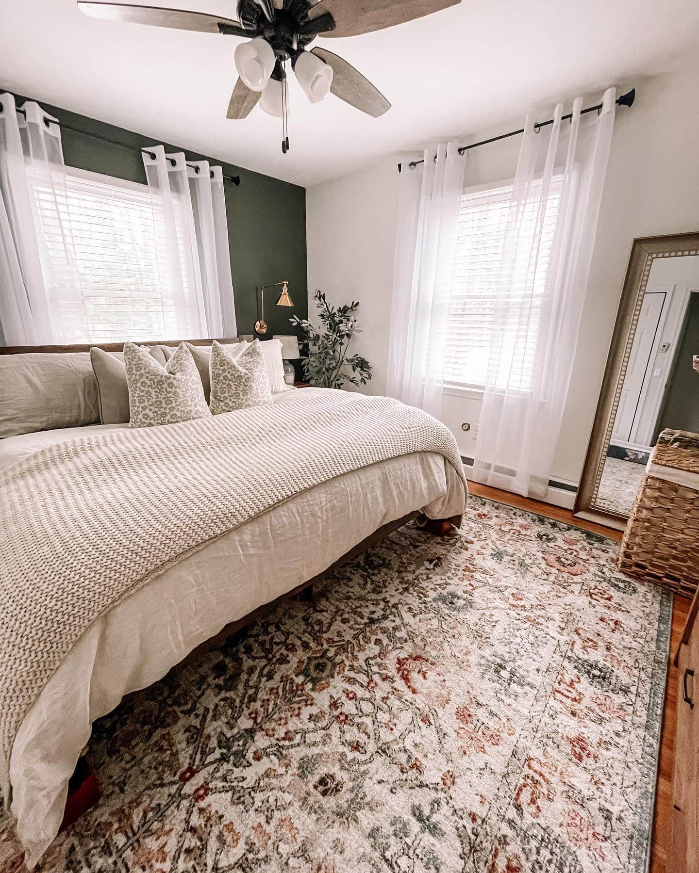 Dark Green Accent Wall Pairs with Creamy Bedding