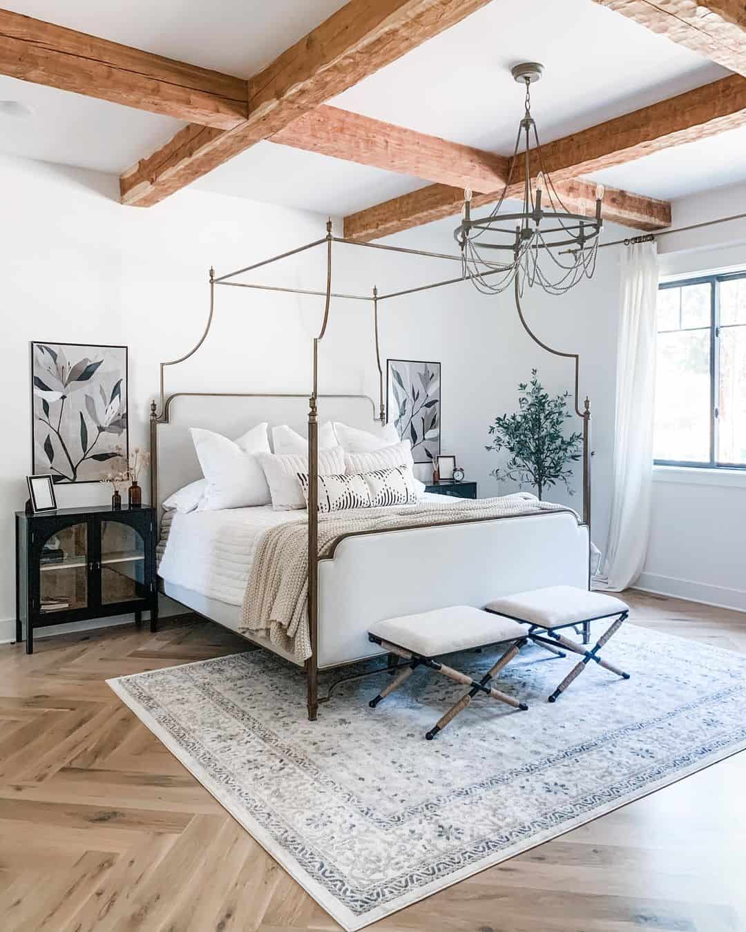 Brass Canopy Bed Frame Softens Rustic Beams