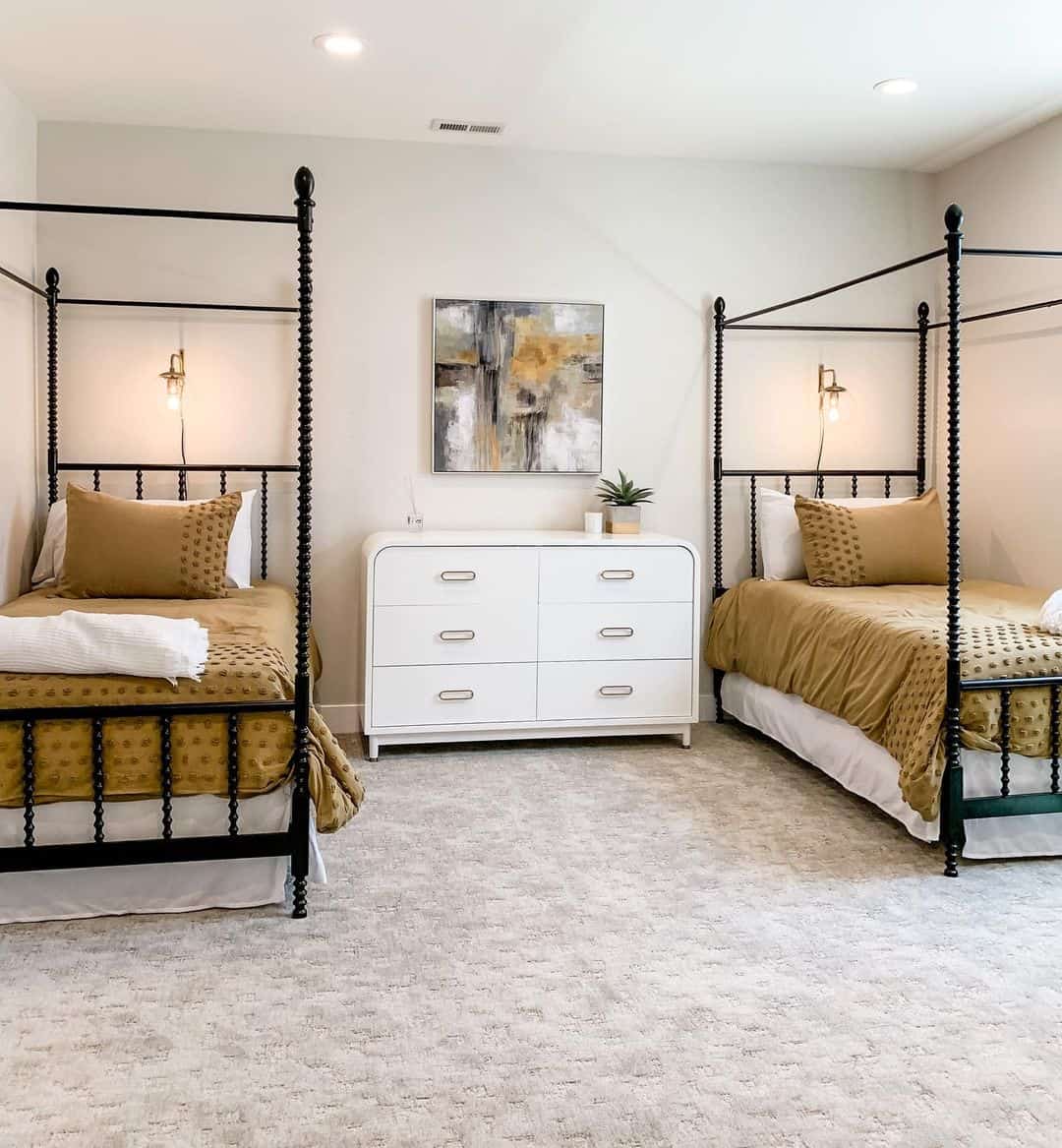 Black Spindle Four-Poster Beds Frame the Room