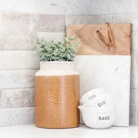 Stoneware Jar with Greenery for a Cozy Kitchen Corner