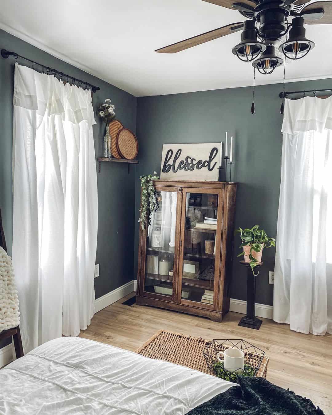 Glass-Fronted Dark Wood Cabinet Displays Farmhouse Treasures