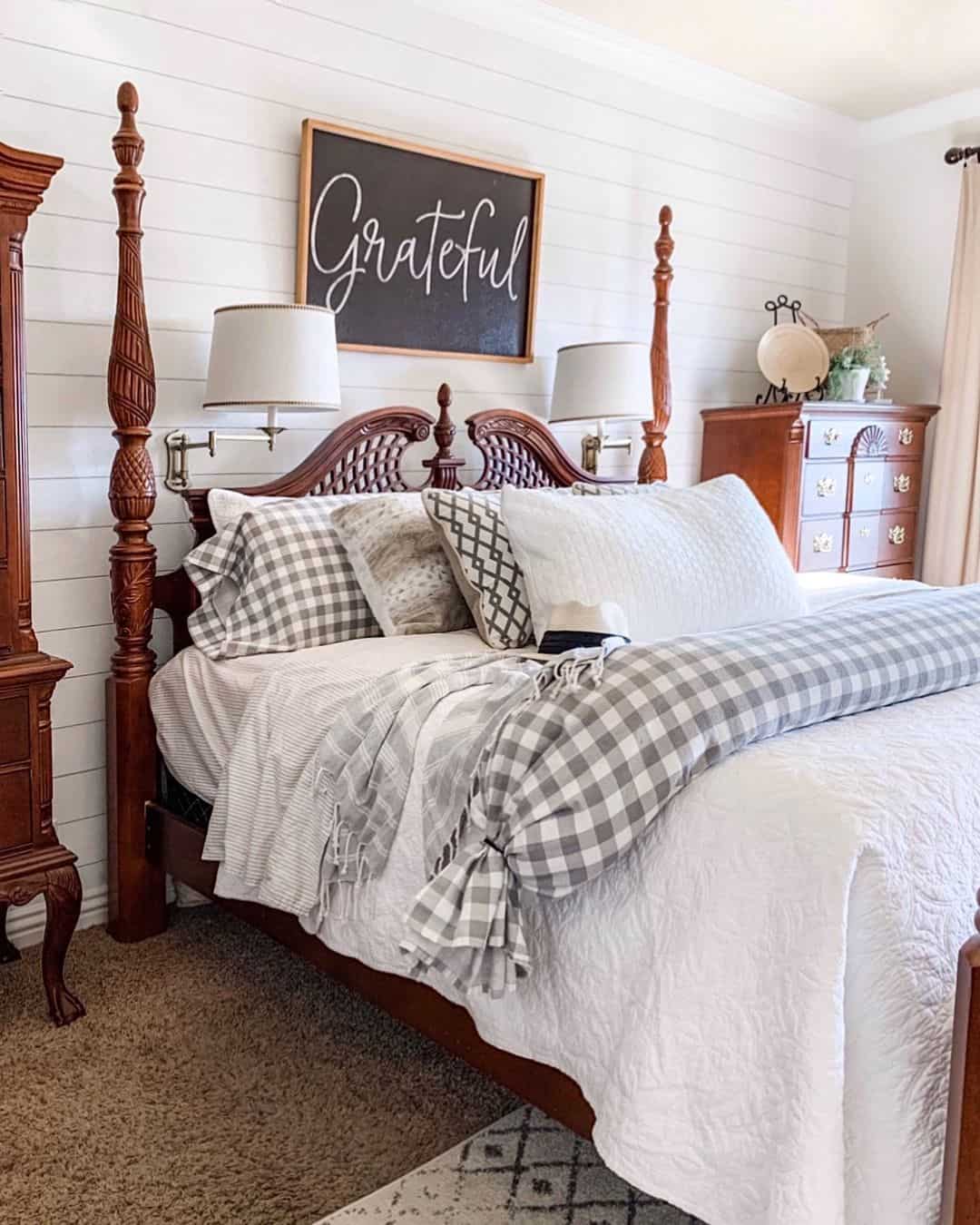 Dark Wood Four-Poster Bed Anchors Farmhouse Bedroom
