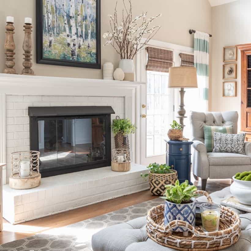 Layered Fireplace Mantel Decor With Artwork and Candlesticks
