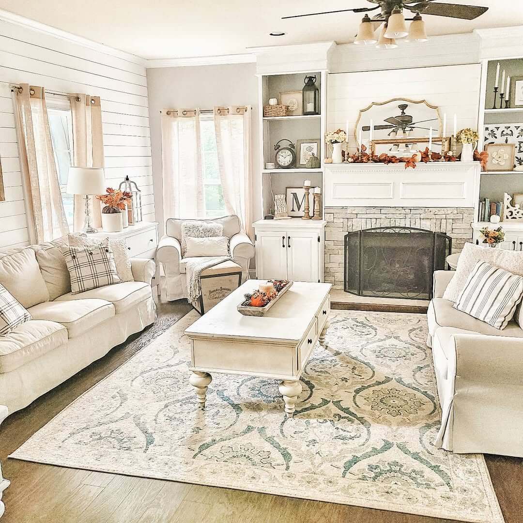 White Mantel With Stone Fireplace Offers a Cozy Focal Point