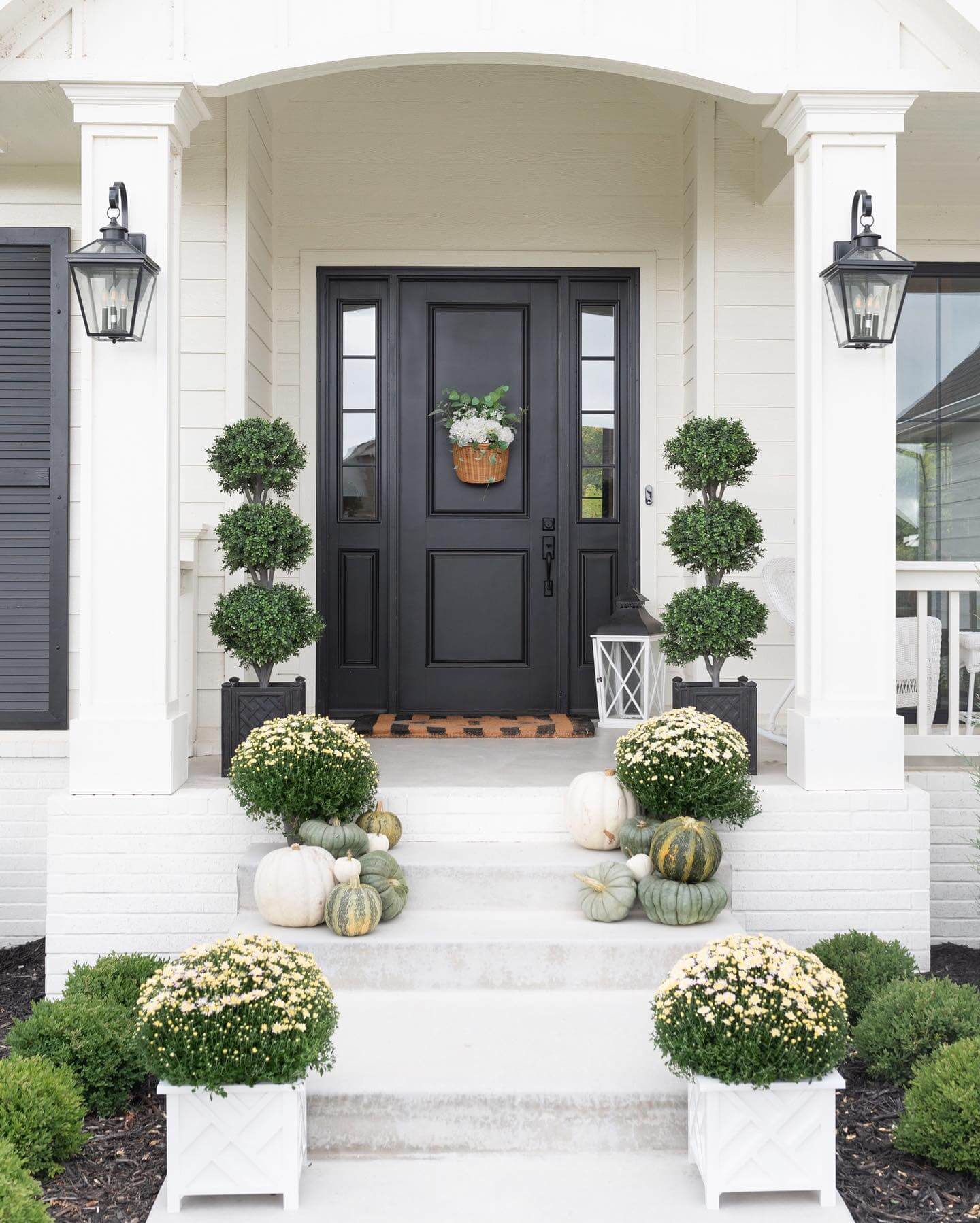 Topiary Trees Frame a Welcoming Fall Entry