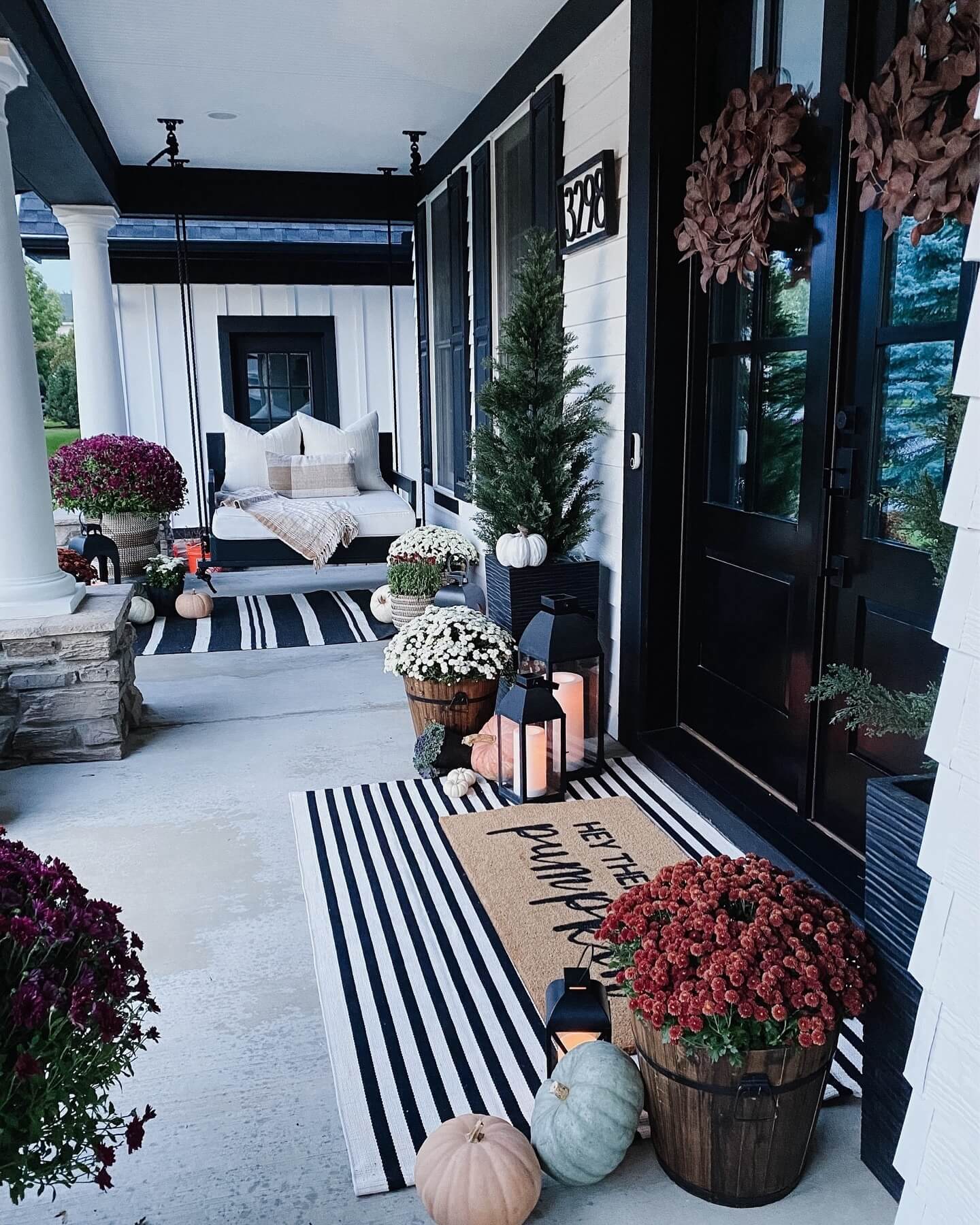 Layered Striped Rugs Define Entry Zones
