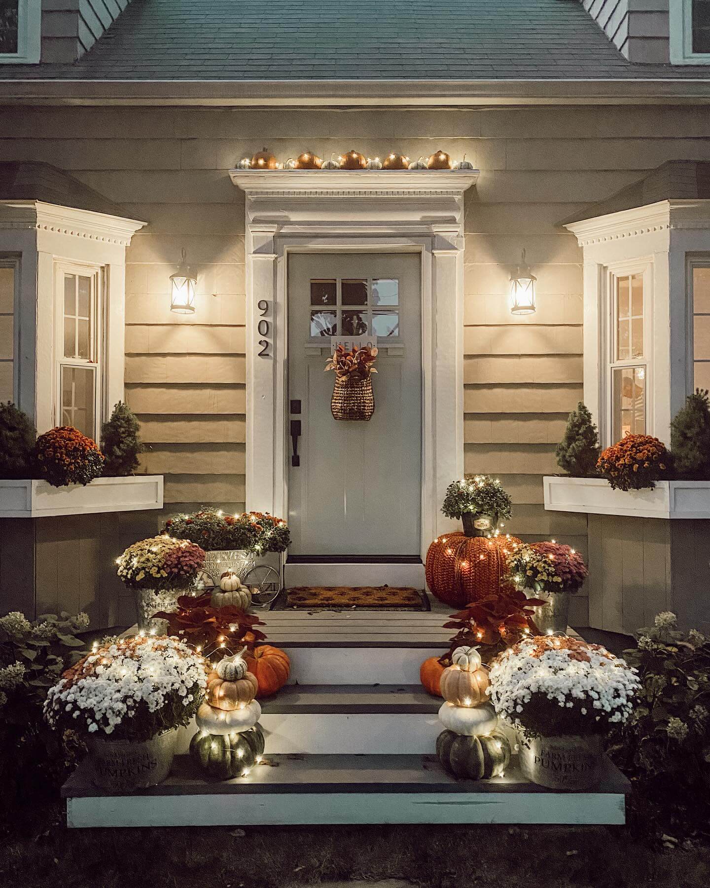 Stacked Pumpkins and Mums with Fairy Lights