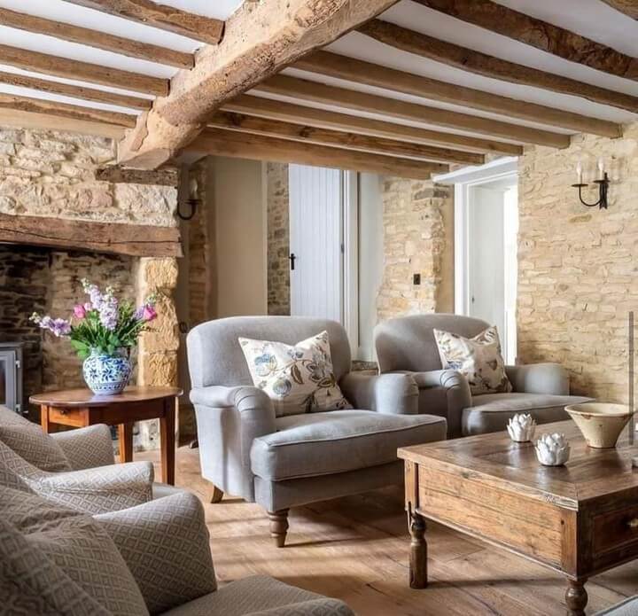 Stone Walls and Wood Beams Create a Rustic French Country Feel