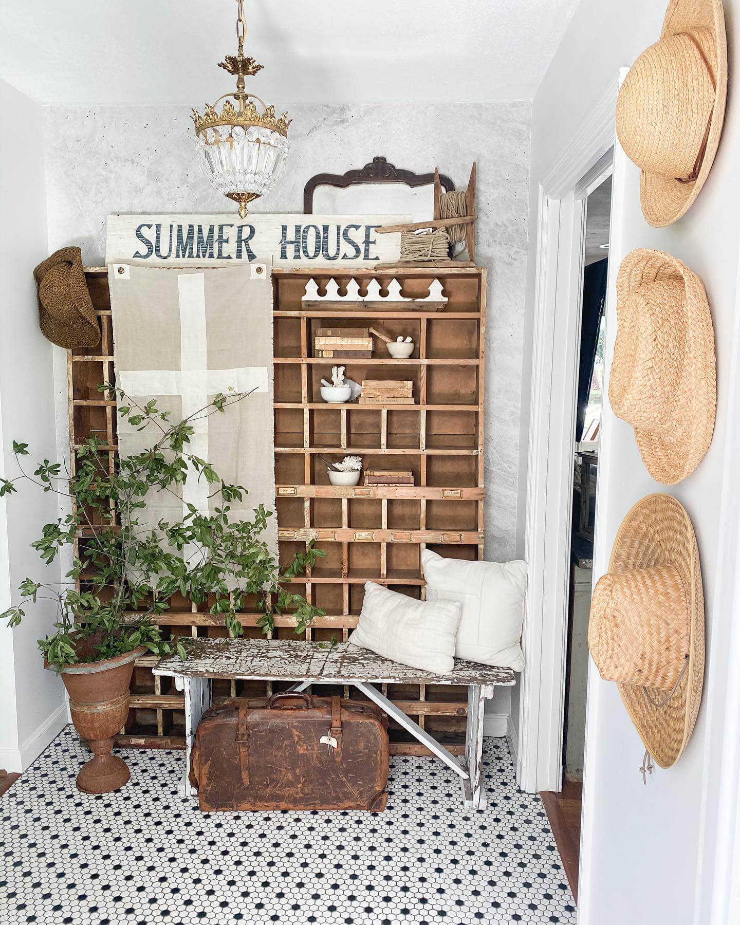 Vintage Suitcase Adds Character Under a Distressed Bench
