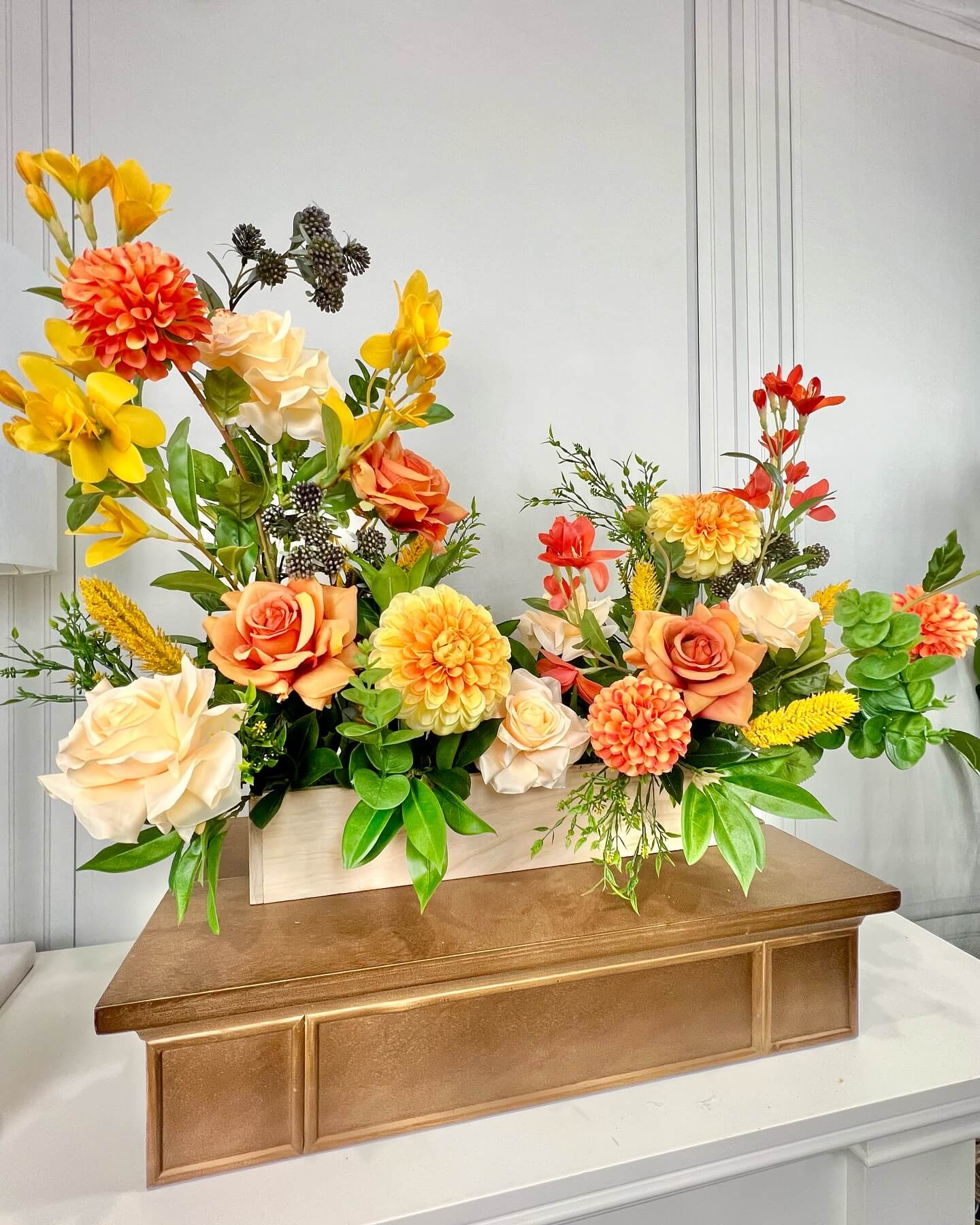 Ground Bright Blooms in a Wooden Crate