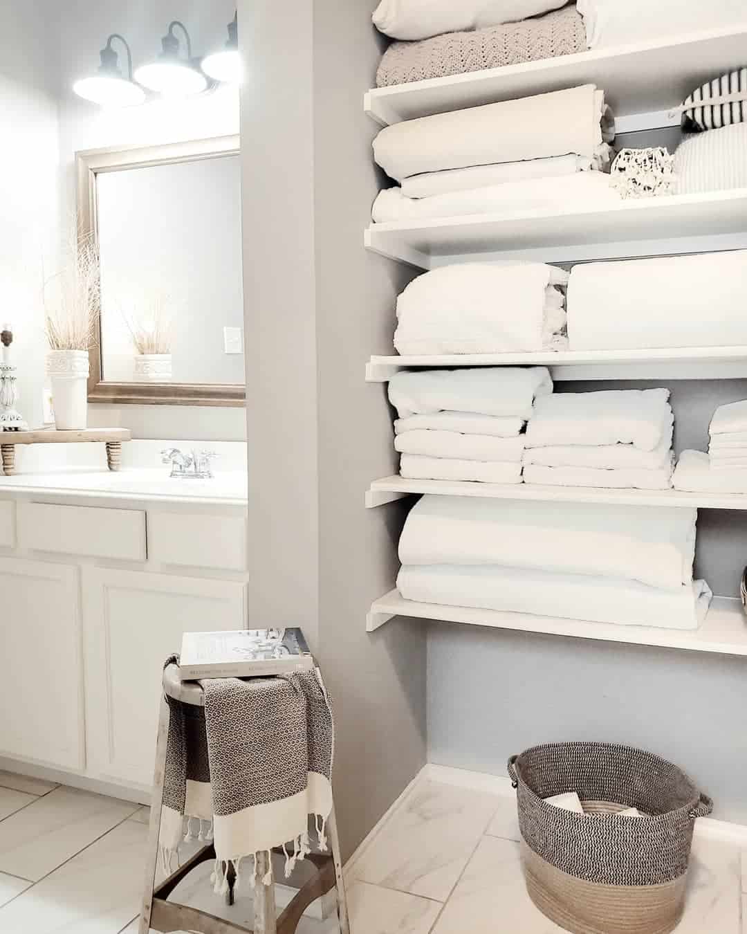 Stack Linens High on Narrow White Floating Shelves