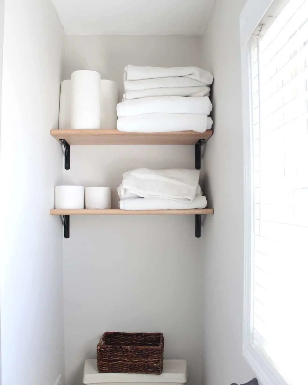 Simple Wood Shelves Stack Toiletries and Linens