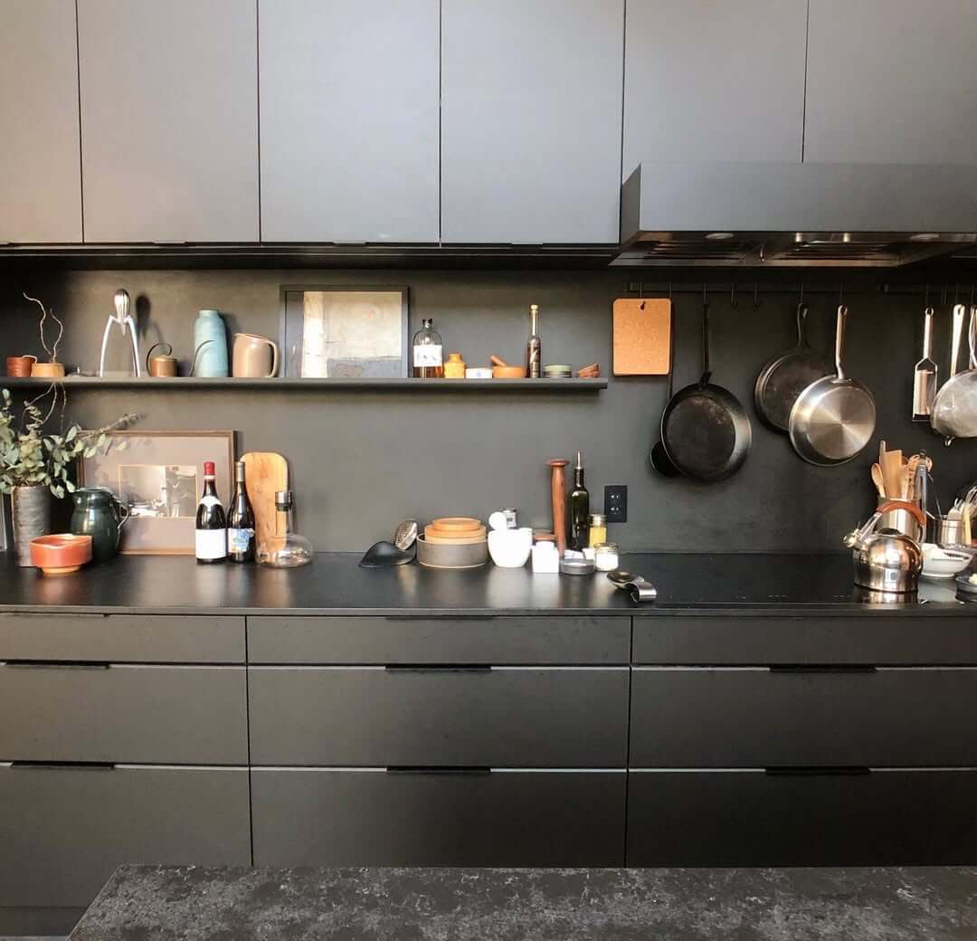 Pots and Pans Hung on a Rail Keep the Counter Clear