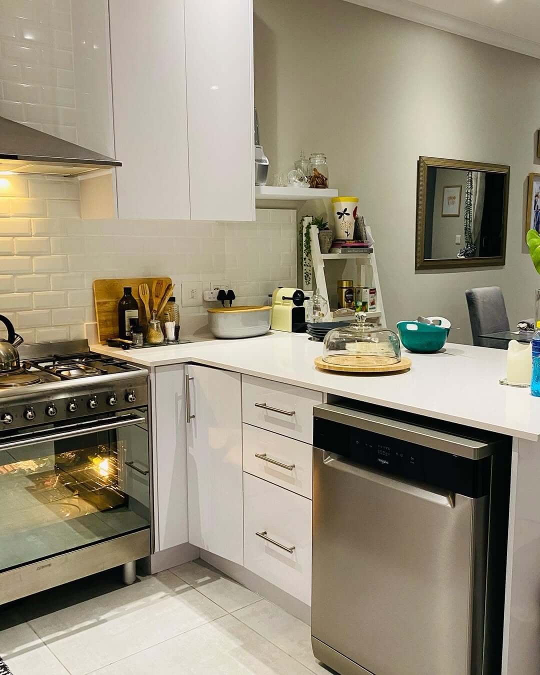 Ladder shelf displays cookbooks and decor