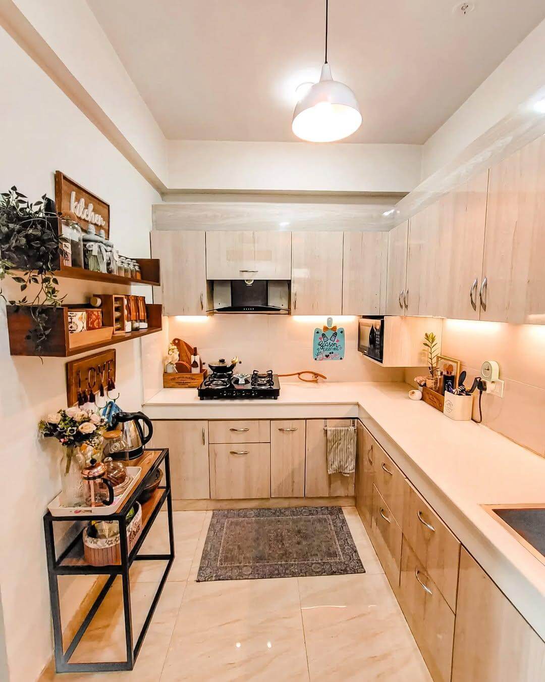 Clear Countertops with Wall-Mounted Wooden Shelving
