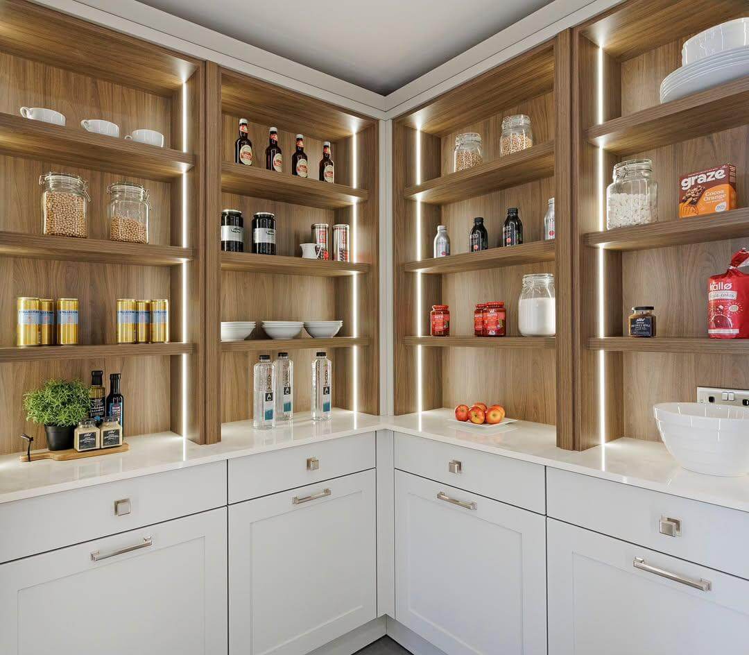 Integrated LED Lighting Illuminates Wooden Pantry Shelves