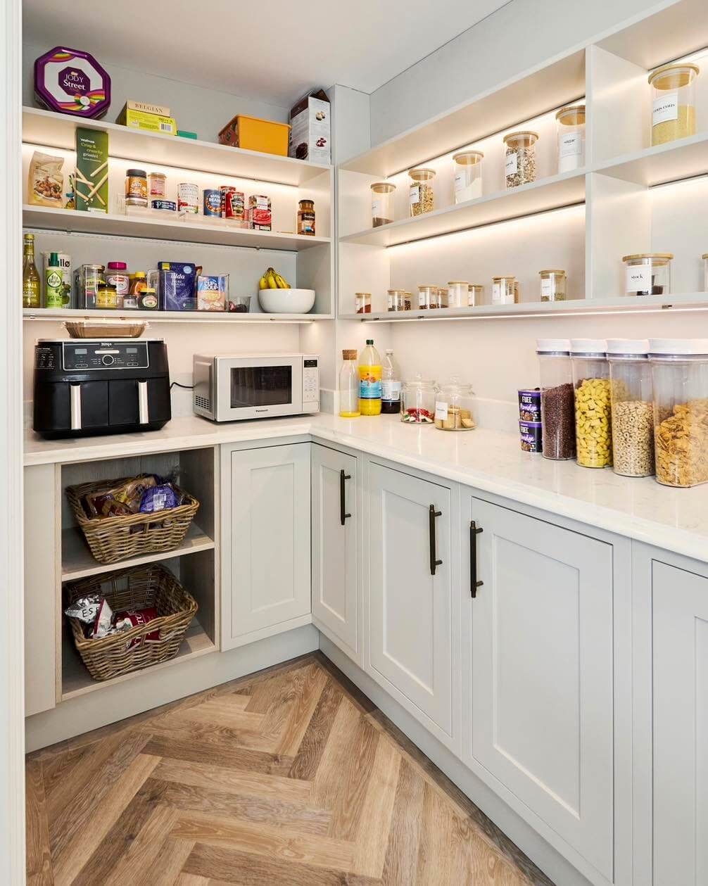 Open-Fronted Cubbies Hold Woven Baskets for Easy Snack Access