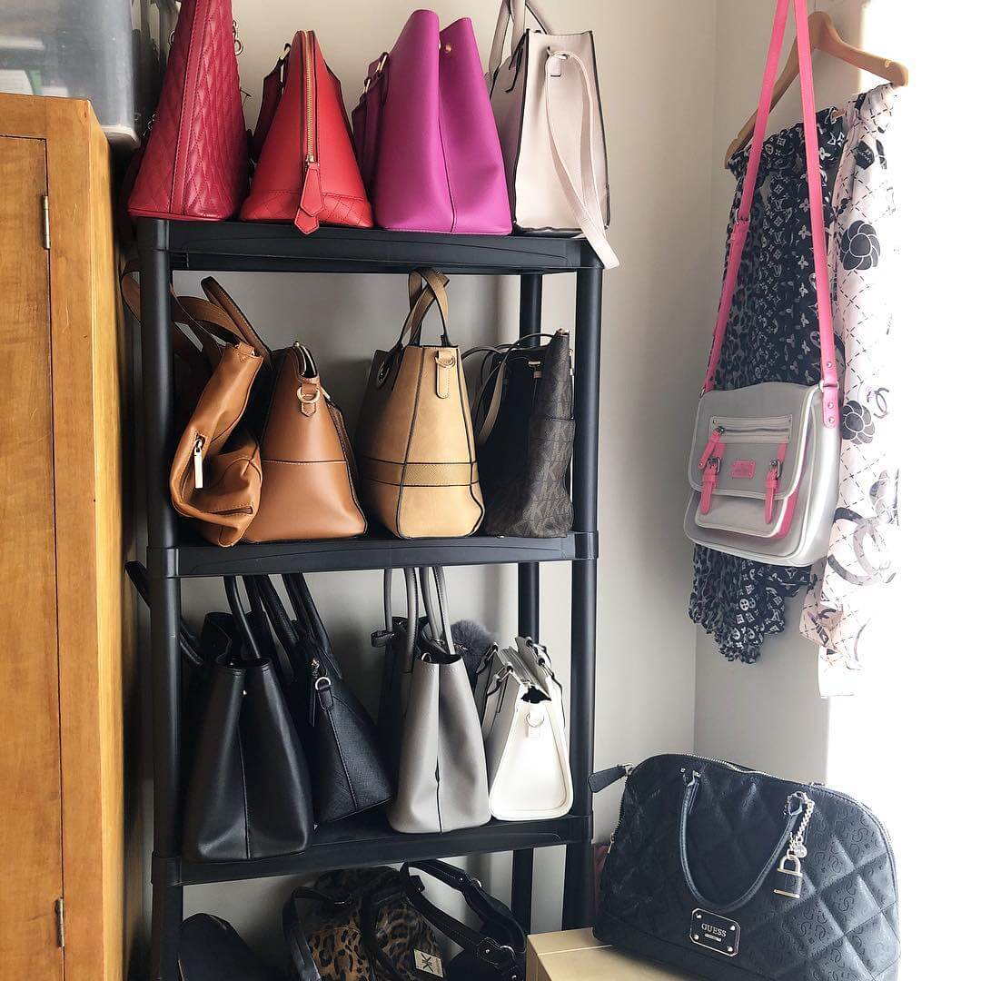 Black Tiered Shelving Unit for Organizing Multiple Handbags