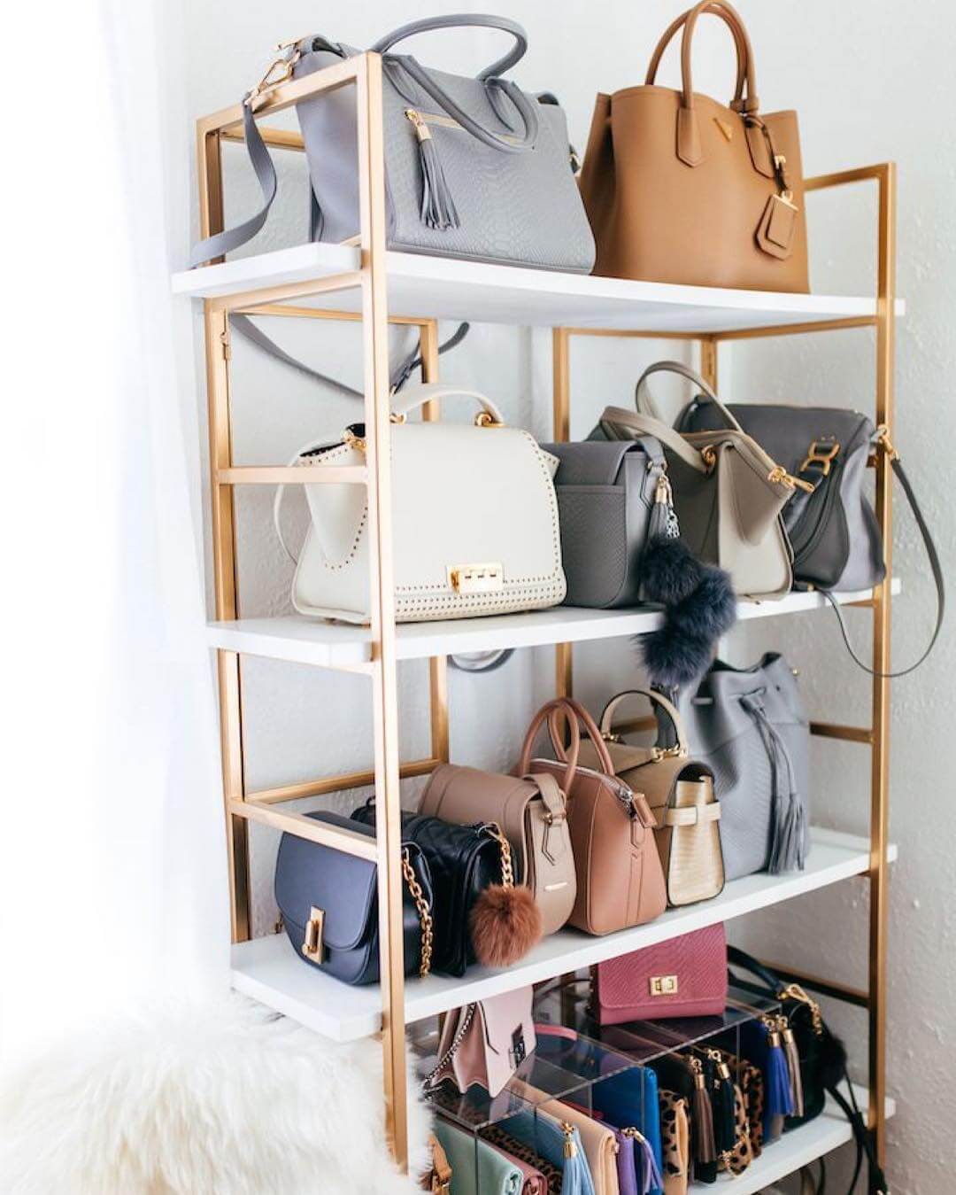 Tiered Gold Shelf Organizes Purses by Size and Style