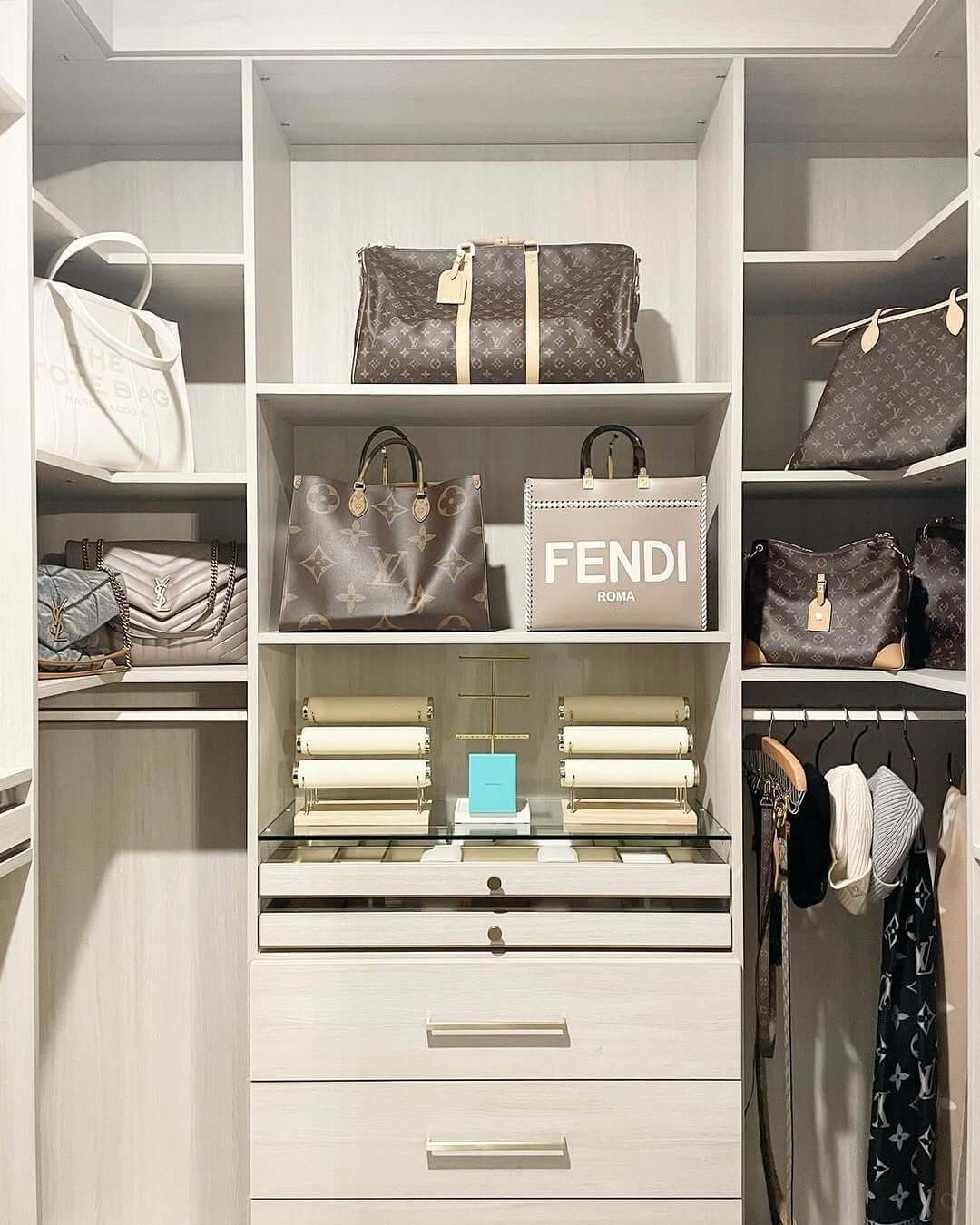 Jewelry Stands Hold Scarves and Belts on Glass Shelves