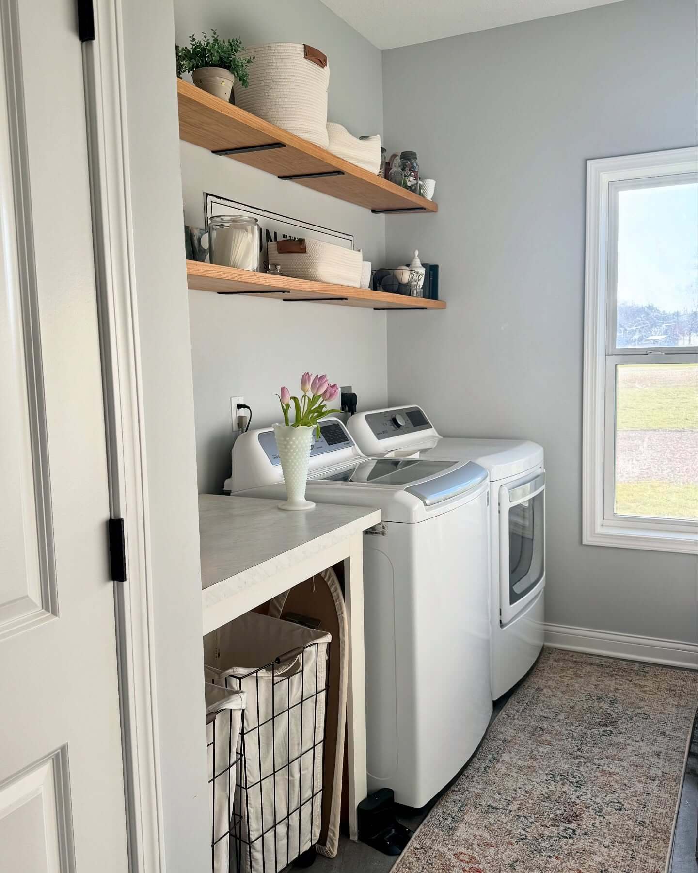 Floating Wood Shelves Create Open Storage Above Your Machines