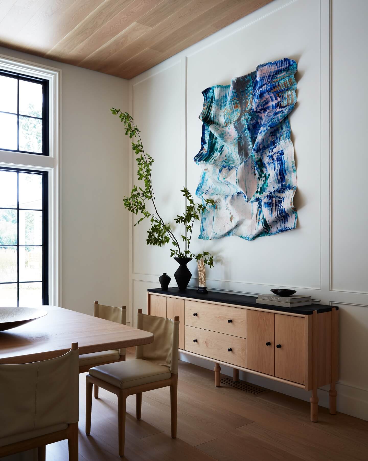 Sculptural Wall Art Adds Dynamic Texture Above a Credenza
