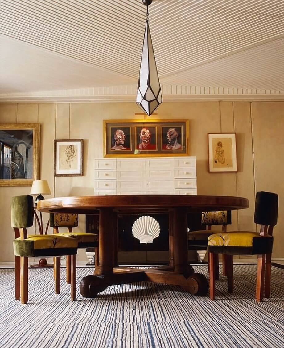 Triptych of Portraits Adds Dramatic Focal Point Above Buffet
