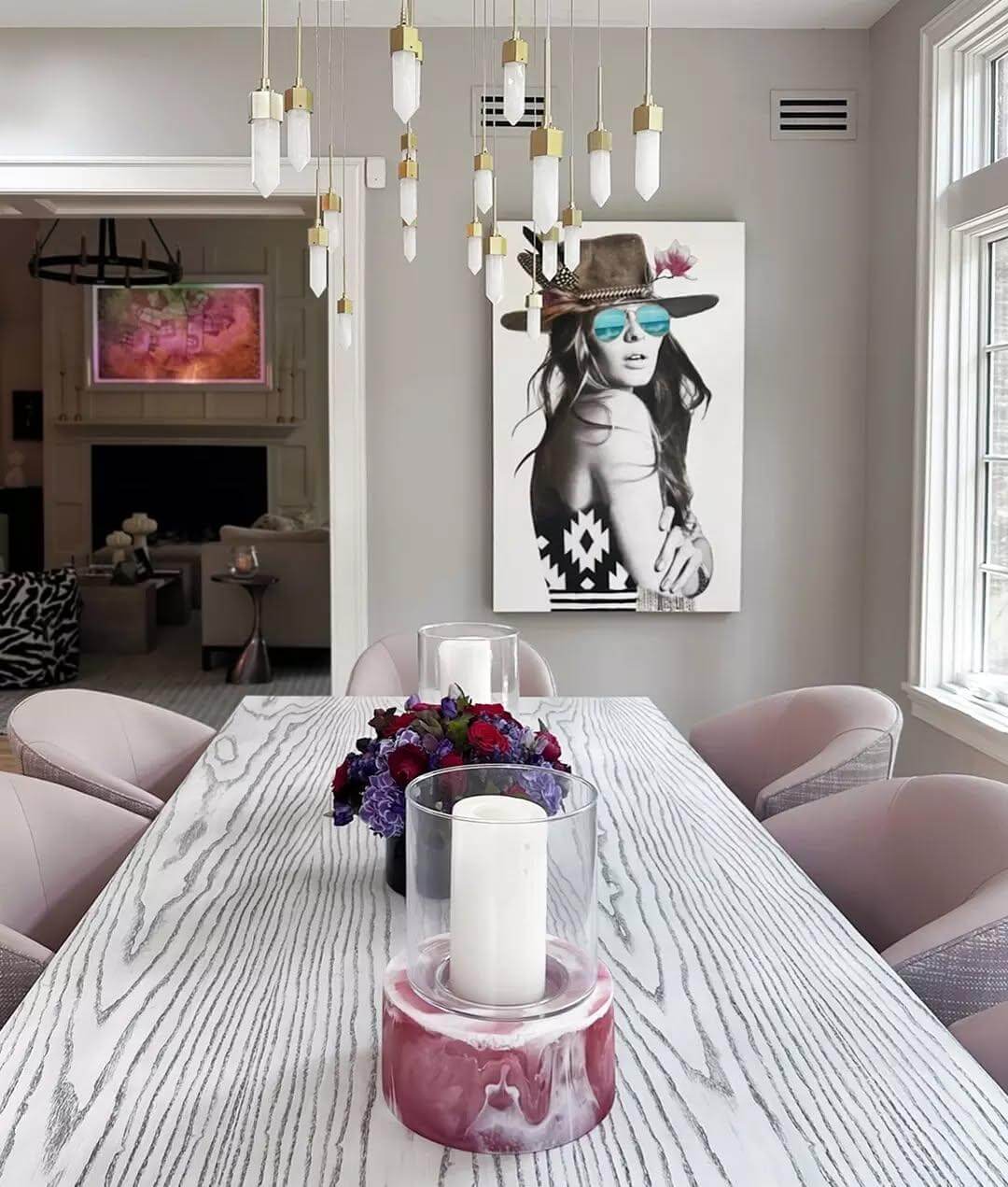 Fashionable Portrait Art Anchors a Chic Dining Room