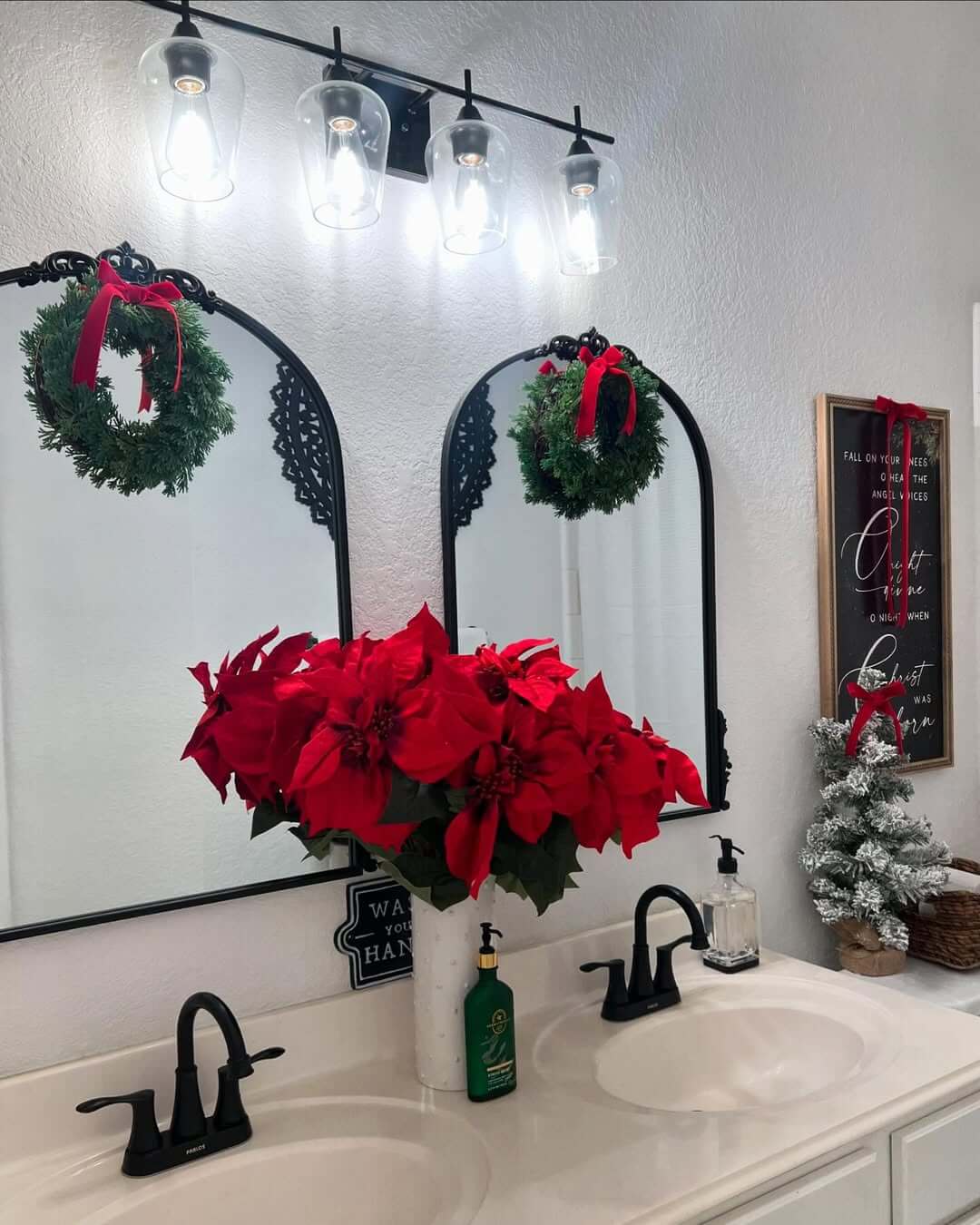 Arched Mirrors Frame Small Wreaths for a Festive Touch
