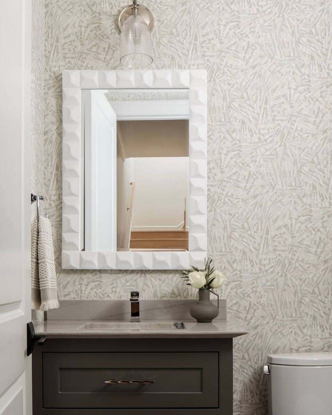 Textured White Mirror Adds Dimensional Interest to Vanity