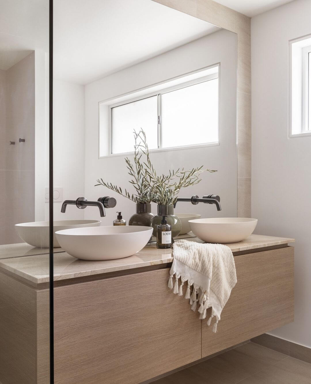 Double Wood Vanity with Stone Countertop and Subtle Texture