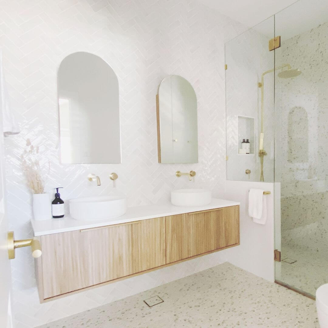 Arched Medicine Cabinet Adds Subtle Curves to Vanity