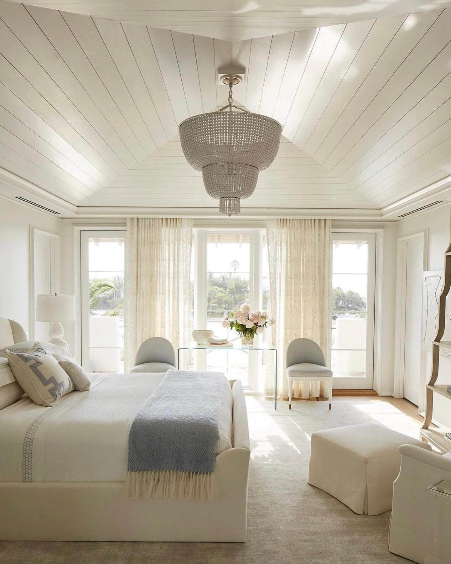 Tiered Chandelier Adds Glamour to Planked Ceiling