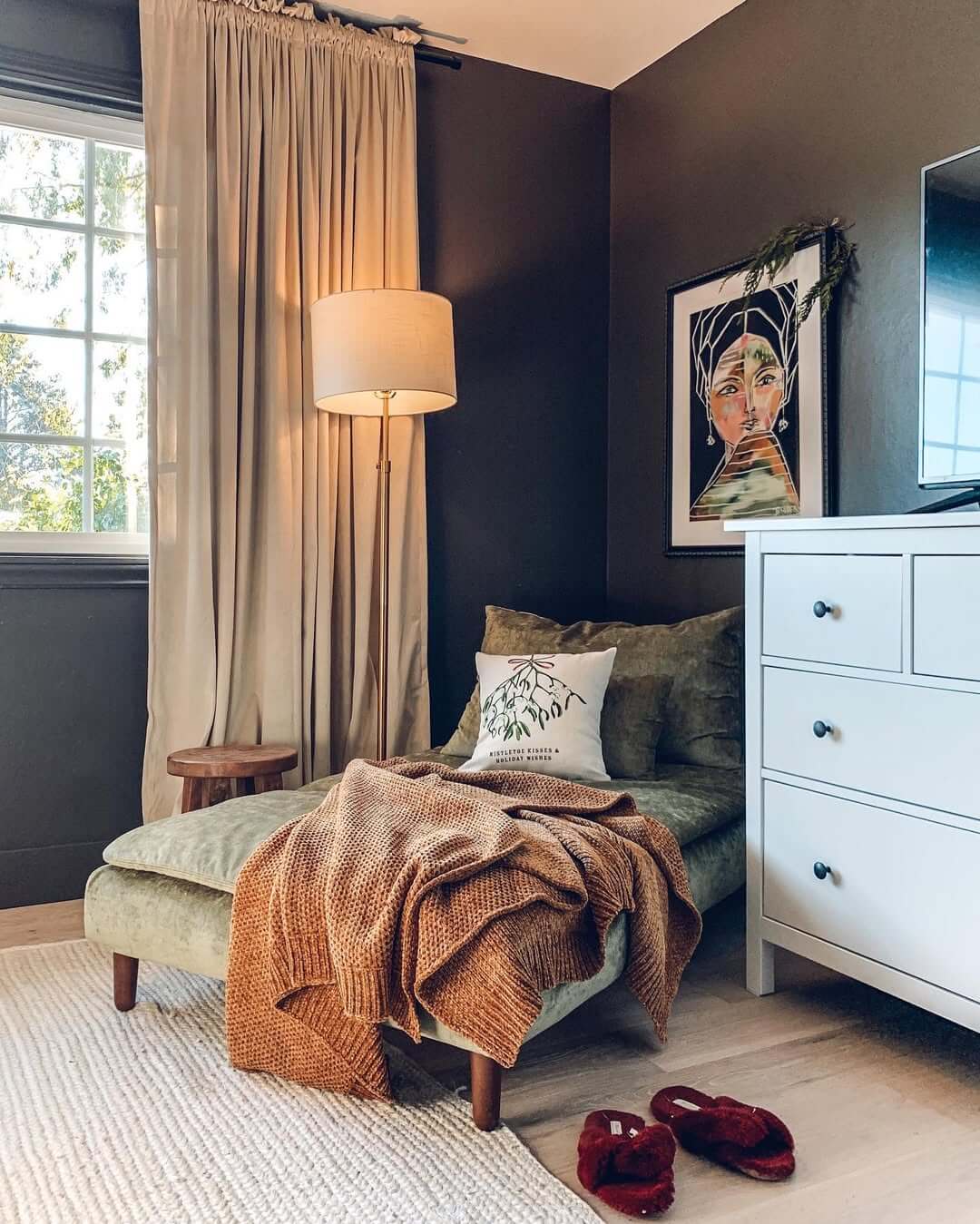 Velvet chaise lounge creates a plush reading nook